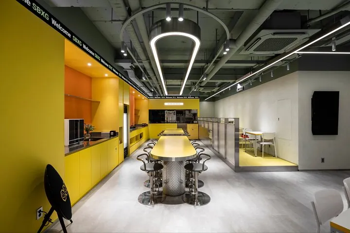 FEARX Kitchen interior with yellow counter and dining bar