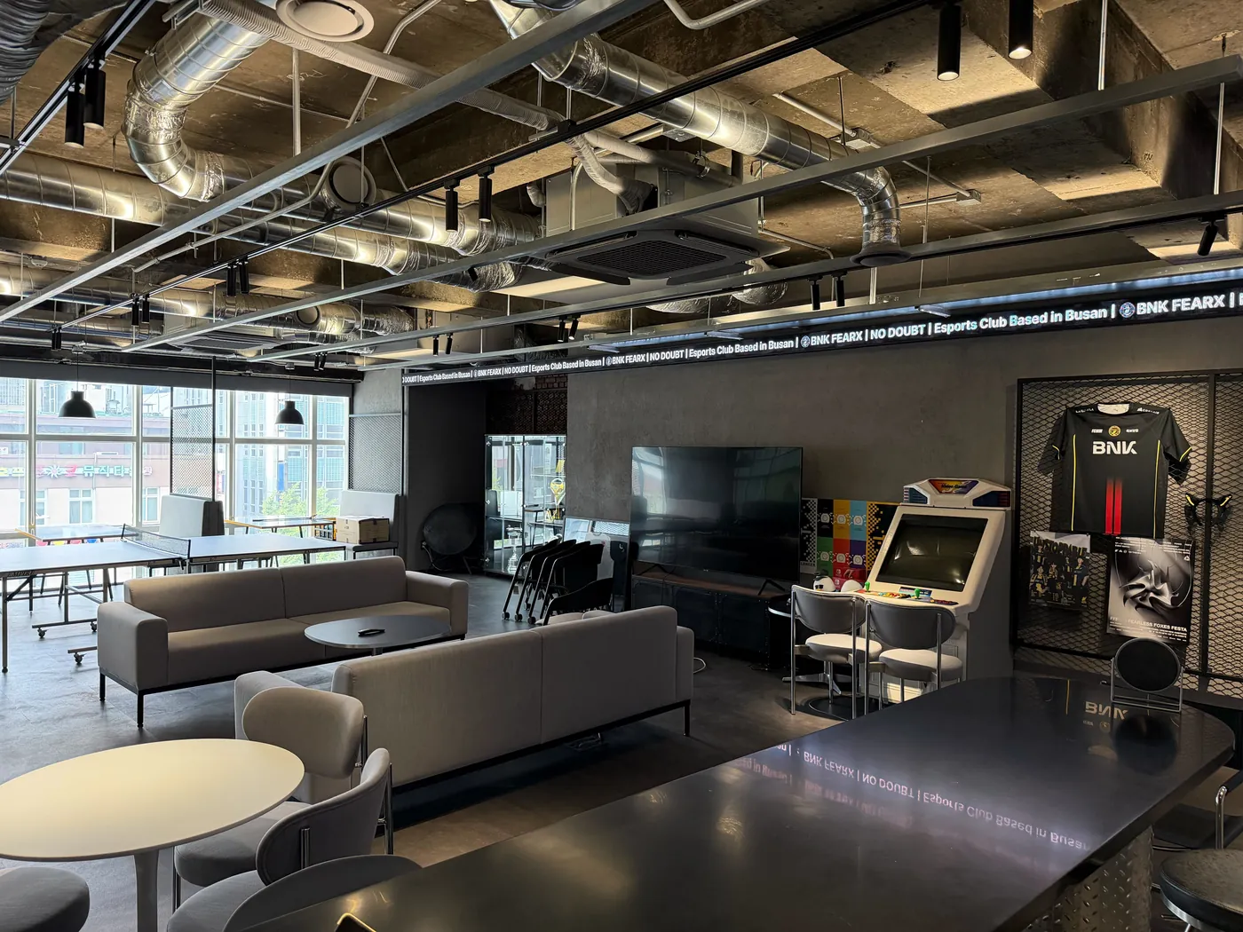 4F lounge with jersey display and bar seating