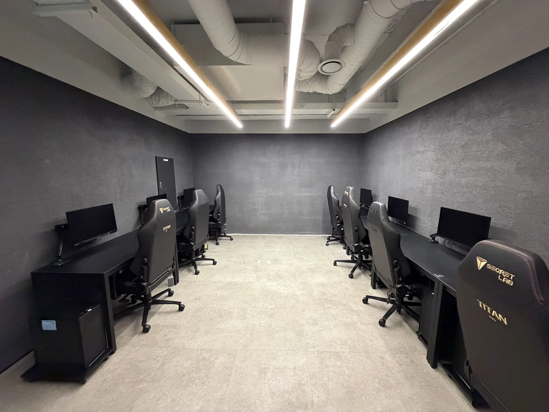 5F training room with practice stations along both walls